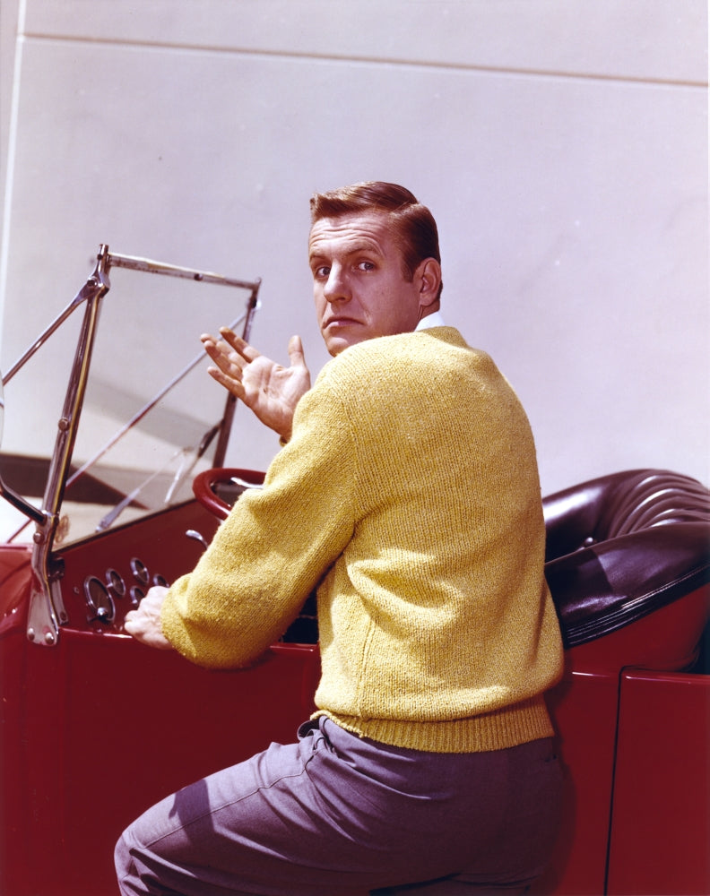 Jerry Van Dyke photo print in yellow knitted coat and grey linen pants.