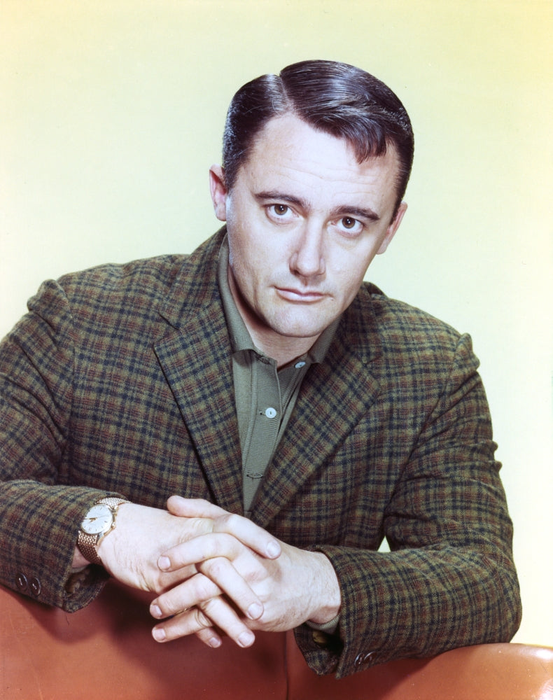 Robert Vaughn posed in suit with hands clenched together photo print