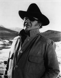 Photo print of John Wayne wearing an eye patch, classic cinema decor.