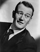 John Wayne Looking to the Left Photo Print in Black Suit