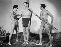 Johnny Weissmuller tied up in a pole movie scene photo print.