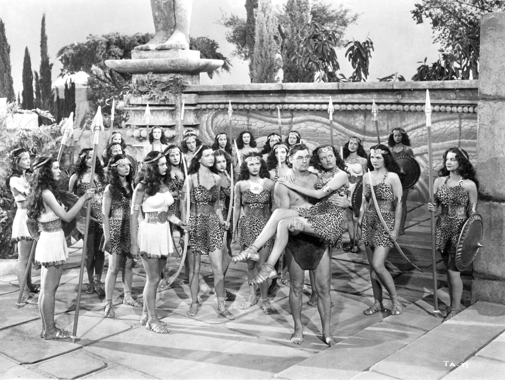 Johnny Weissmuller bridal carrying scene photo print from classic film.