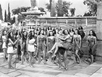 Johnny Weissmuller bridal carrying scene photo print from classic film.