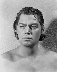 Close-up portrait photo print of Johnny Weissmuller looking away.