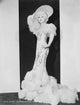 Mae West elegant photo print in long gown with fur
