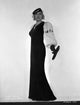 Mae West posed elegantly in black with fur sleeves photo print