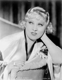 Mae West sitting in a white robe portrait photo print