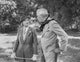 Film still photo print of a man and woman talking, available in multiple sizes.