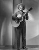 A Portrait of Ray Whitley photo print showcasing classic cinema.
