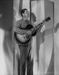 A Portrait Of Ray Whitley Photo Print showcasing vintage photography.