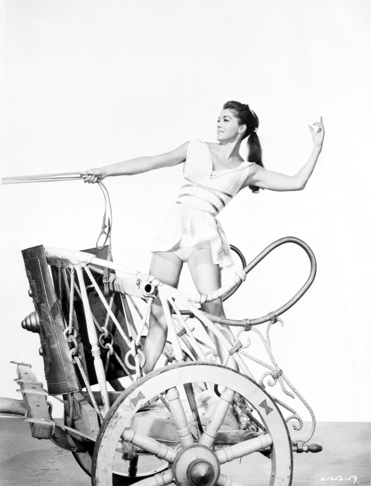 Esther Williams on a horse-drawn vehicle photo print