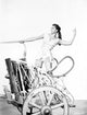 Esther Williams on a horse-drawn vehicle photo print