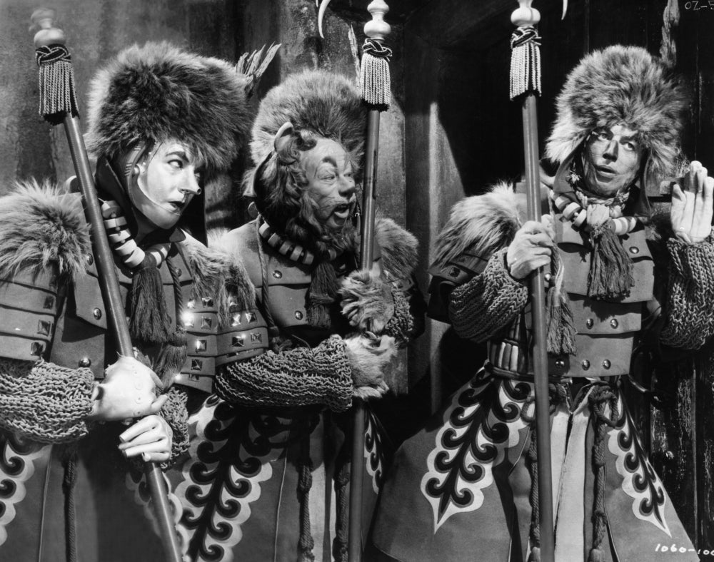 Wizard Of Oz black and white photo print of guards saving Dorothy.