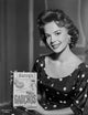 Natalie Wood holding a cookbook photo print
