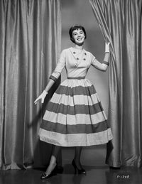 Natalie Wood standing in stripes skirt photo print