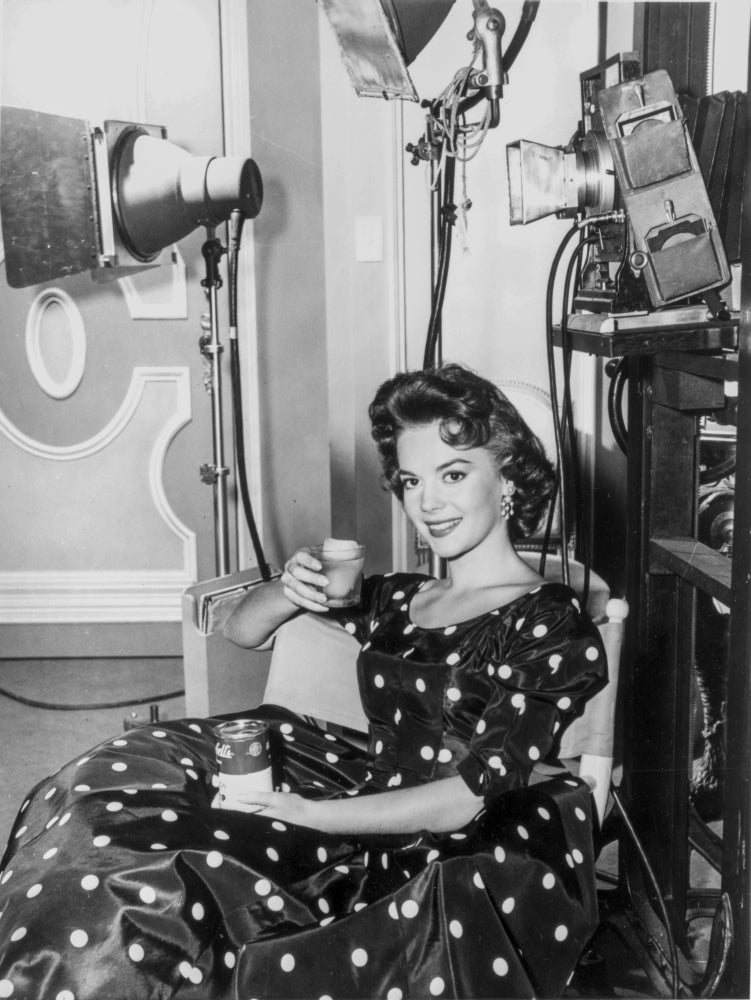 Natalie Wood Hooding a Tin Can and a Cup Photo Print