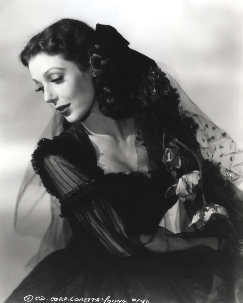 Loretta Young in a black screen long dress photo print