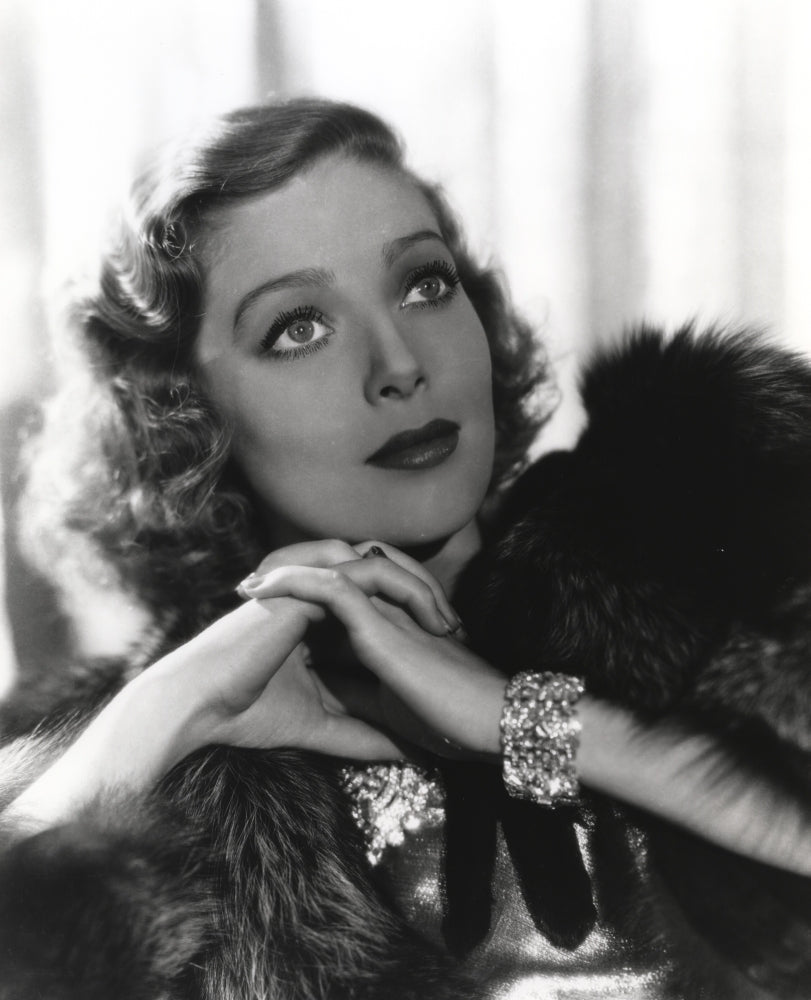 Loretta Young photo print with hairy jacket and blonde curly hair.