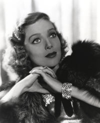 Loretta Young photo print with hairy jacket and blonde curly hair.