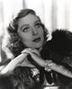 Loretta Young photo print with hairy jacket and blonde curly hair.
