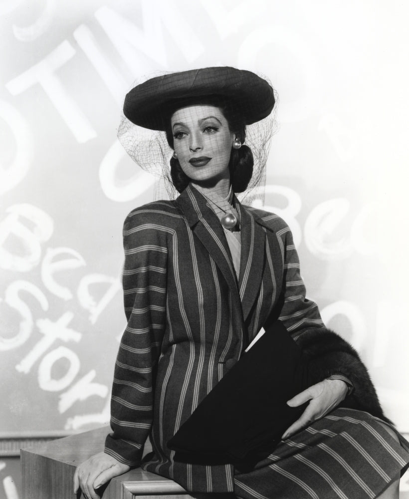 Loretta Young wearing a black striped long sleeve dress suit photo print.