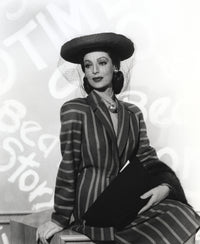 Loretta Young wearing a black striped long sleeve dress suit photo print.