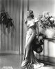 Loretta Young in shiny satin gown black and white photo print.