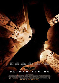 Batman Begins Movie Poster Print featuring iconic imagery from the film.