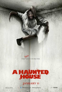 A Haunted House Movie Poster Print showcasing eerie themes.