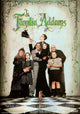The Addams Family movie poster print featuring iconic characters.