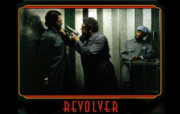 Revolver Movie Poster Print showcasing vibrant artwork.