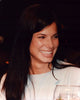 Close-up photo print of Sandra Bullock laughing in white jacket.