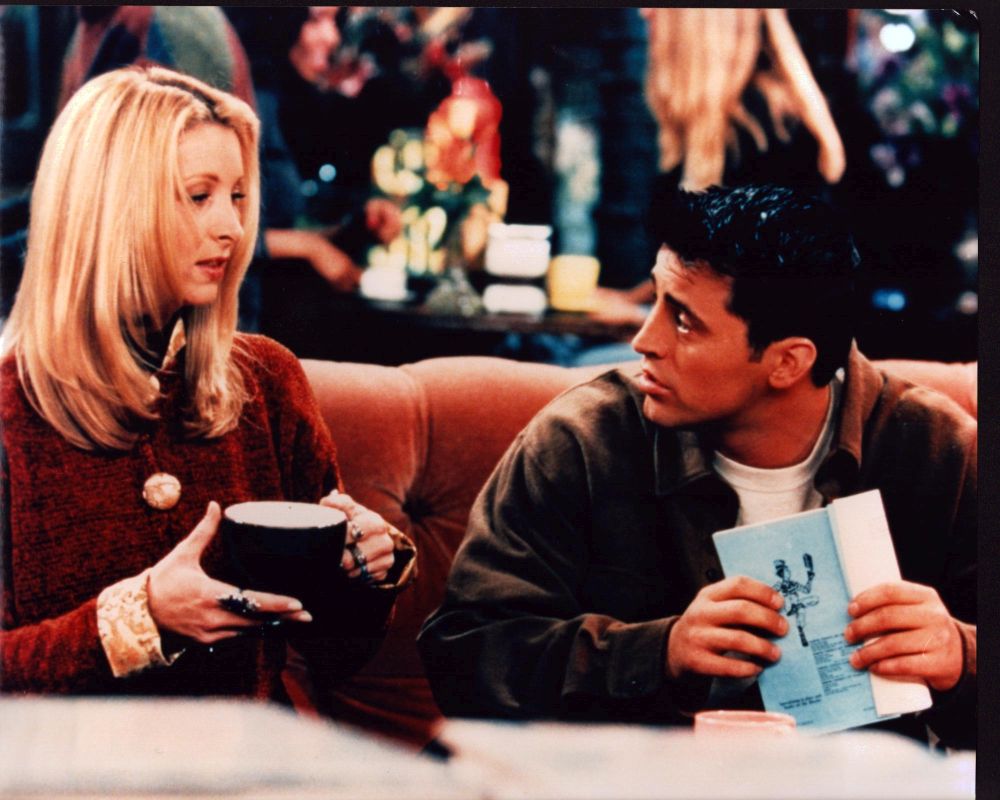 Lisa Kudrow and Matt LeBlanc on couch in Friends photo print.