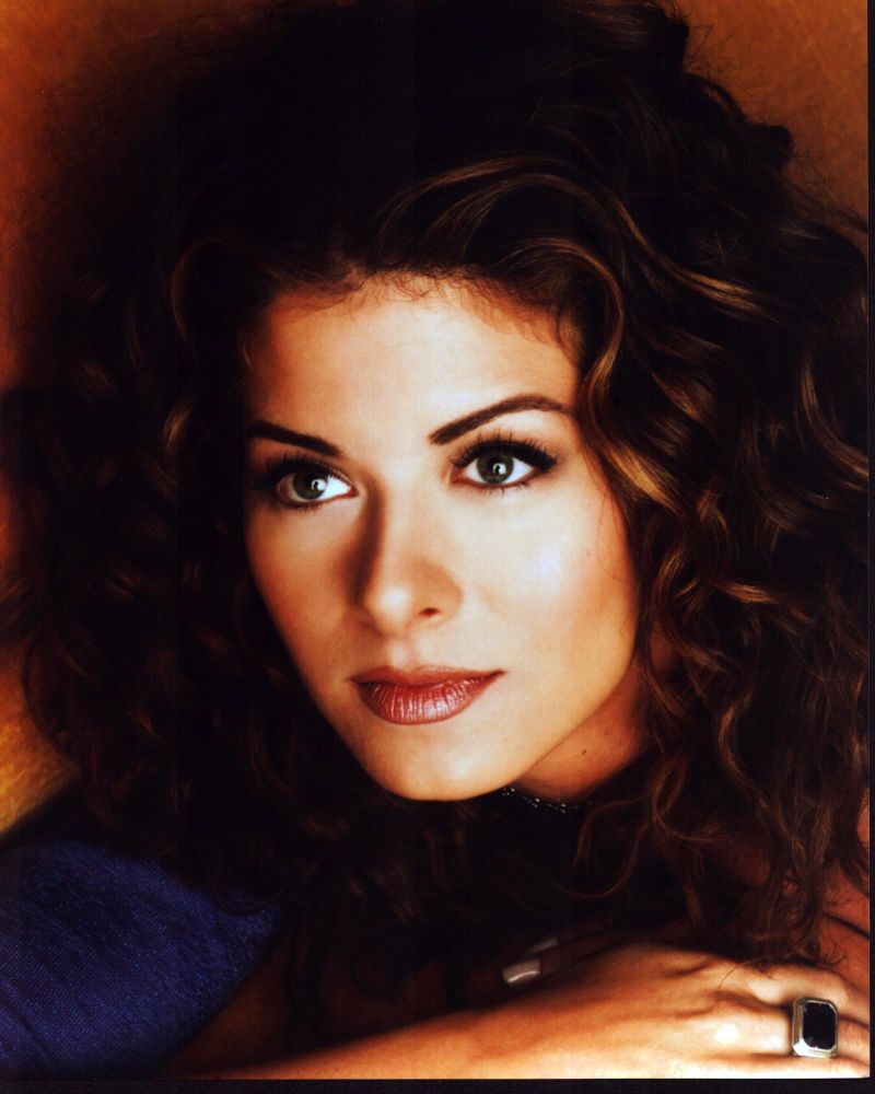 Debra Messing close-up photo print in blue top, vibrant colors.