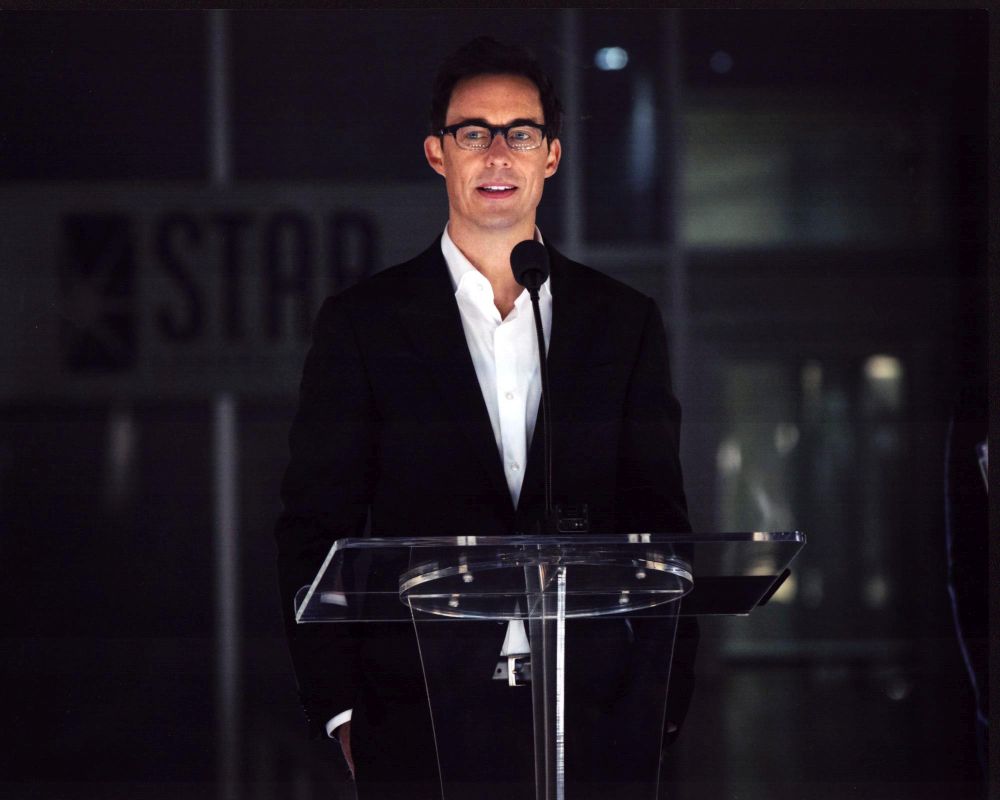 Tom Cavanagh as Harrison Wells speaking at podium photo print