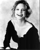 Courtney Thorne-Smith laughing in off shoulder dress photo print.