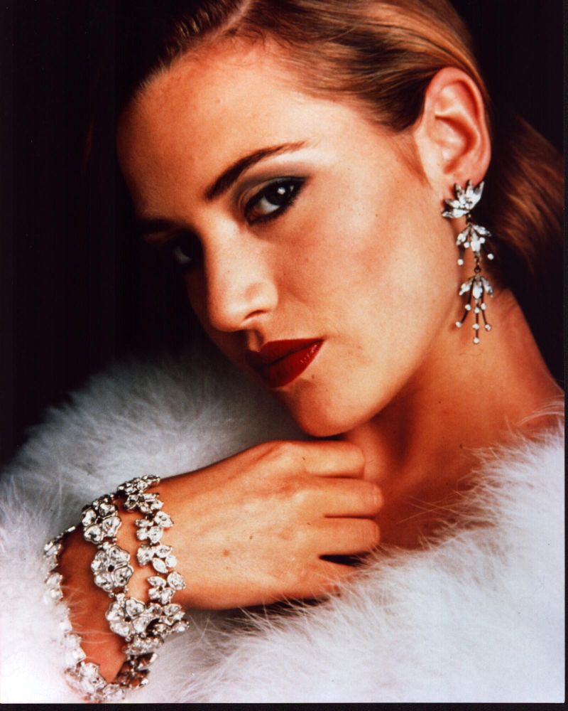 Close-up photo print of Kate Winslet wearing white fur and jewels.