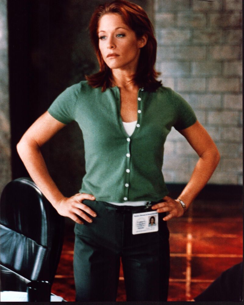Jamie Luner wearing a green sweater photo print