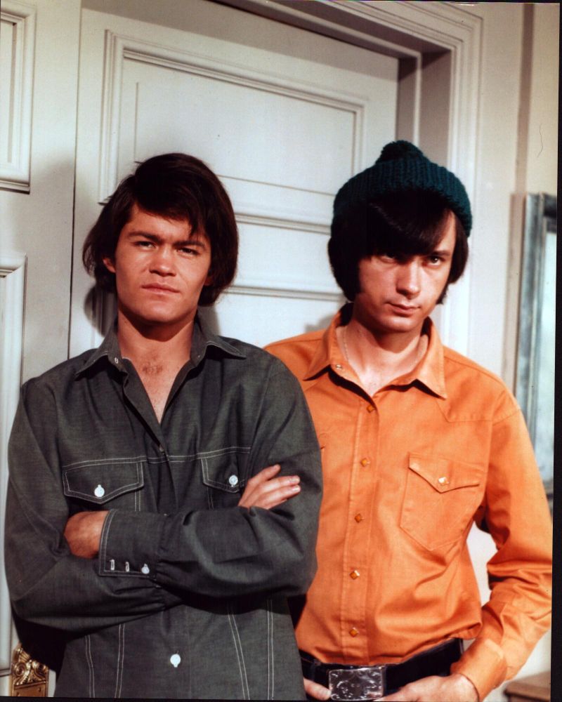 Micky Dolenz in gray shirt and Michael Nesmith in orange shirt photo print