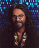 Tommy Chong photo print in brown shirt with floral trim.