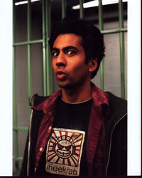 Kal Penn Harold & Kumar Go To White Castle Photo Print in front of jail cell