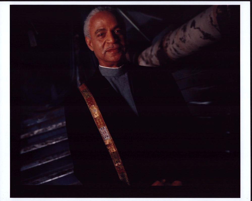 Ron Glass in black jacket and gray top on Firefly set photo print.