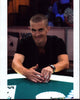 Gus Hansen Playing Poker Photo Print showcasing intensity and excitement in card games.