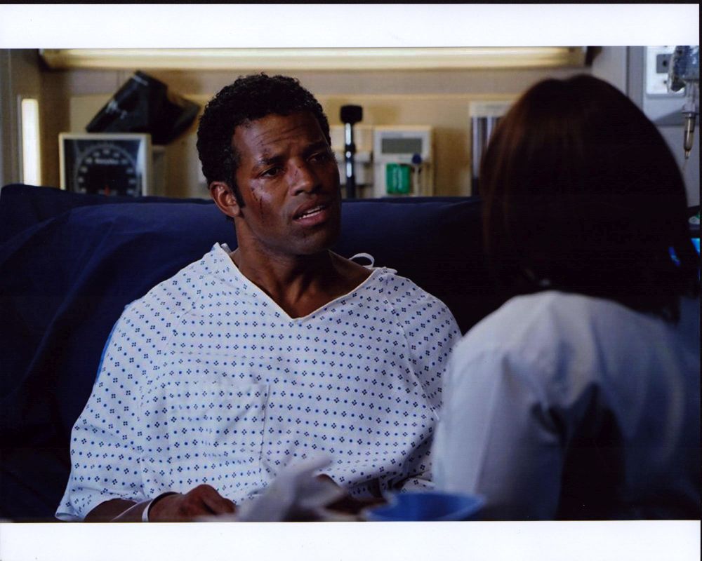 Benjamin Patterson lying in hospital bed photo print from Grey's Anatomy.