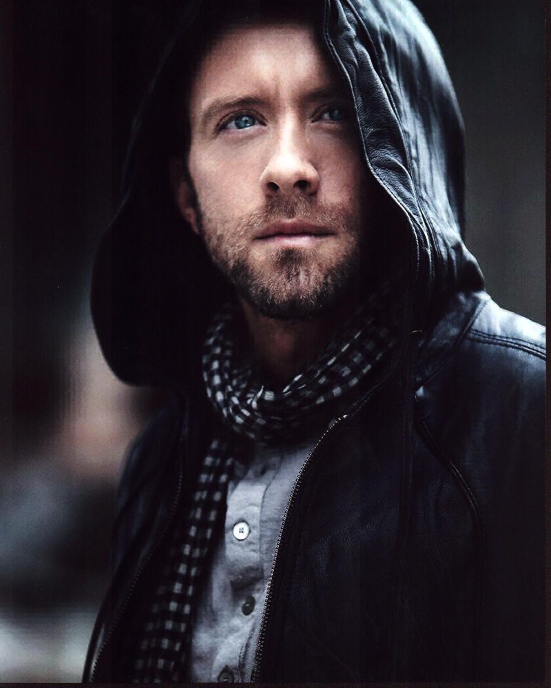 T.J. Thyne photo print wearing a hood and scarf, perfect for fans.