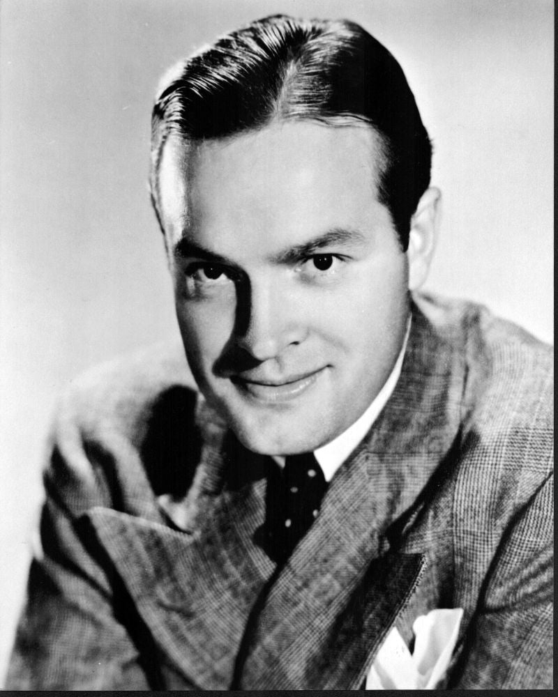 Black and white photo print of Bob Hope in blazer headshot.