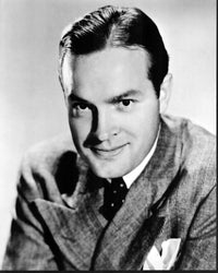 Black and white photo print of Bob Hope in blazer headshot.