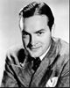 Black and white photo print of Bob Hope in blazer headshot.