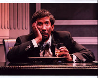 Reg E. Cathey holding head in hands photo print.