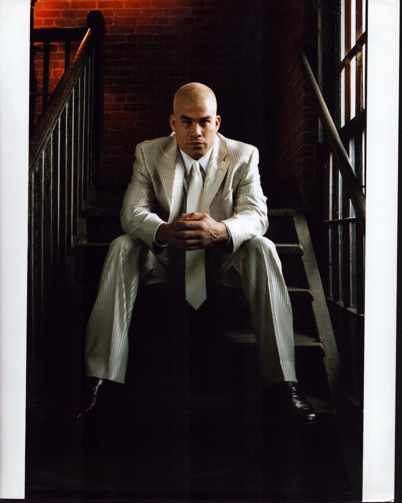 Tito Ortiz photo print in white striped suit on stairs